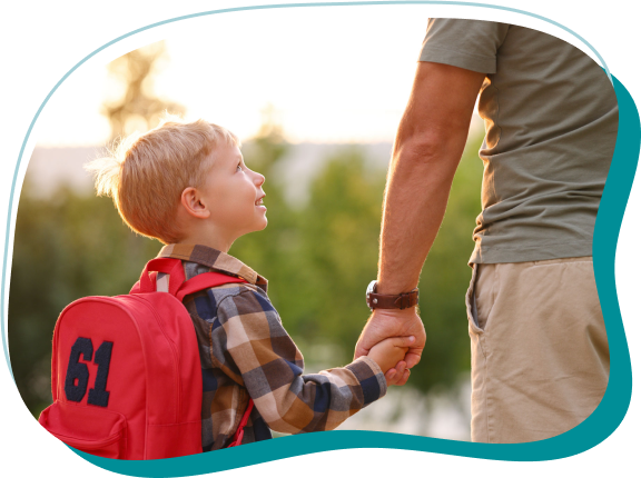 a child holding a person's hand